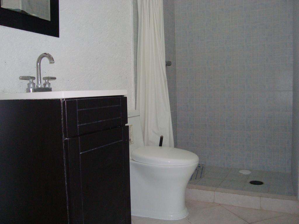 Hotel Teques Inn Текескитенго Стая снимка