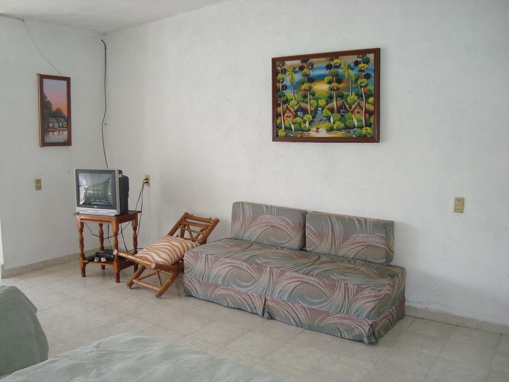 Hotel Teques Inn Текескитенго Стая снимка
